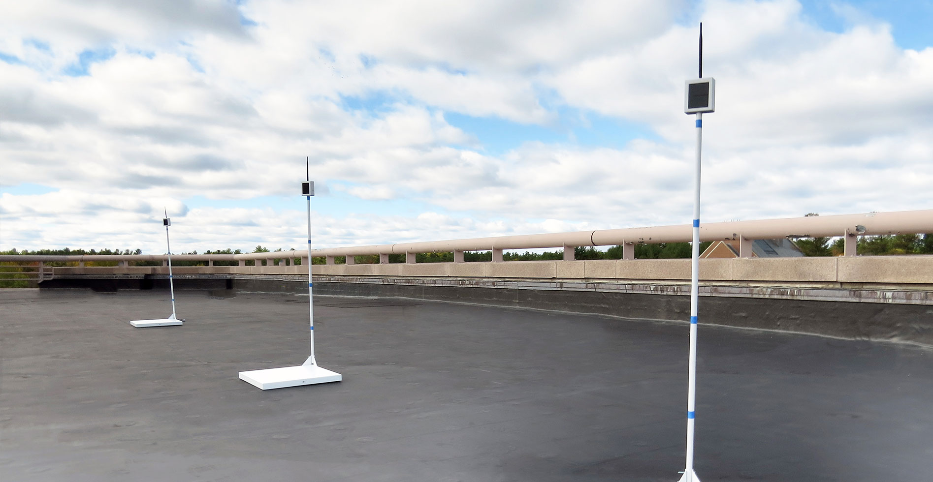 snow monitoring devices on a commercial flat roof