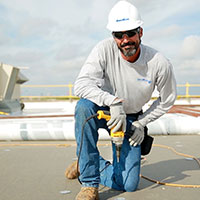 smiling roofer looking at the camera