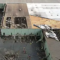 commercial roof damaged by tornado